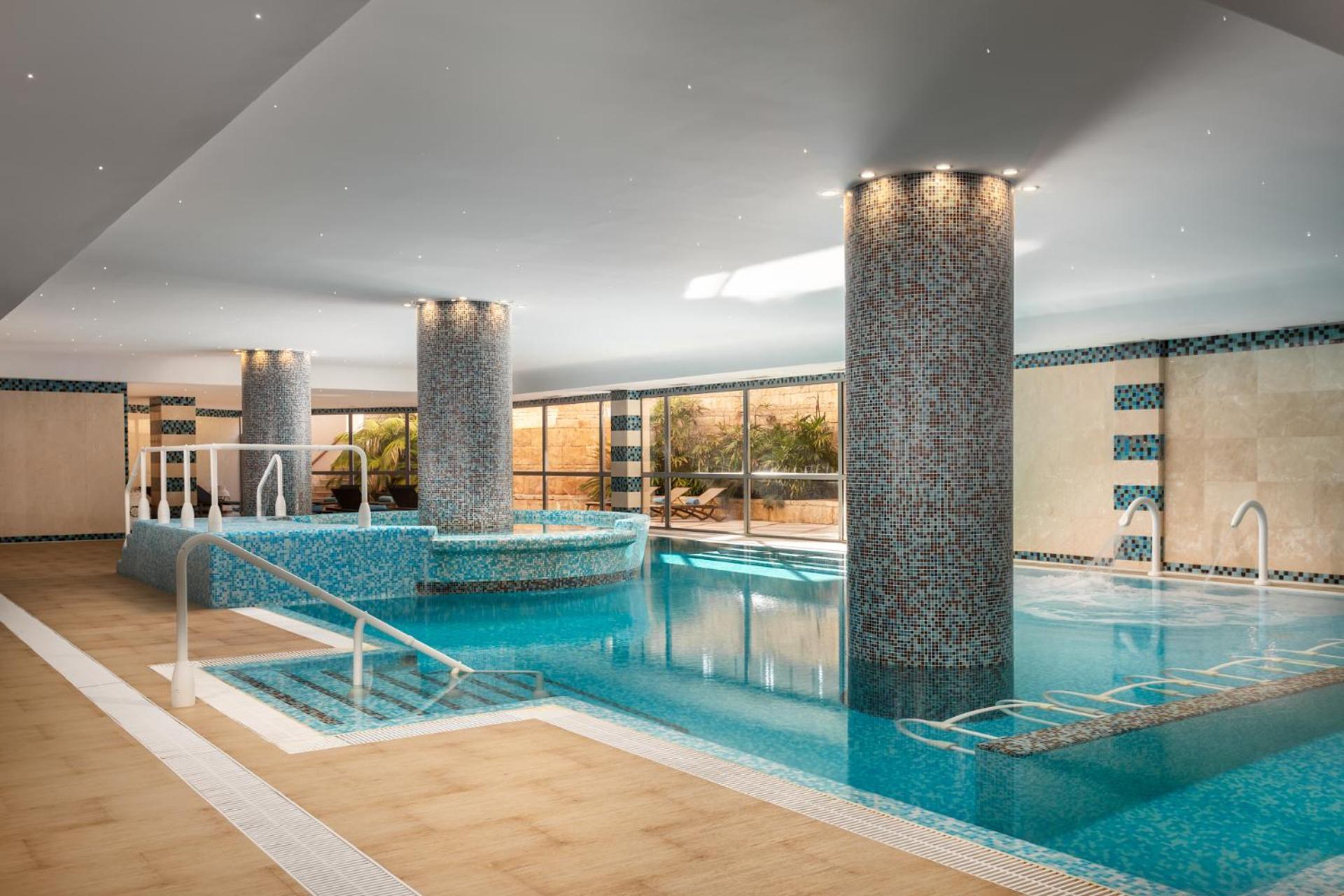 Grande Real Santa Eulalia Resort & Hotel Spa Albufeira Exterior foto The swimming pool at the hotel